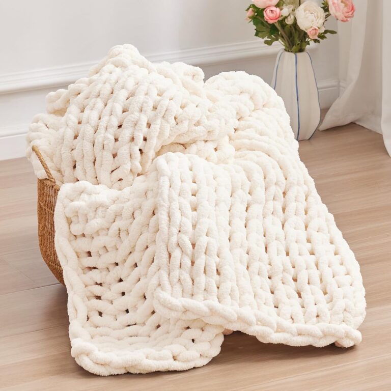 A soft oversized knit blanket that adds warmth, texture, and layered comfort to modern bedroom spaces.