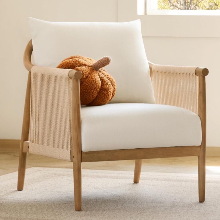 A soft textured accent chair that adds warmth and sculptural style to living rooms, bedrooms, or reading corners while maintaining a clean modern aesthetic.