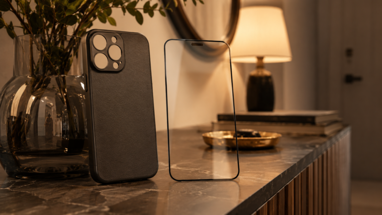 Protective smartphone case and screen protector arranged on a modern entryway table